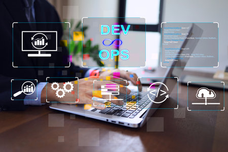Software developer or programmer devops engineer working on laptop to deploy code and software monitor on agile working concept.の写真素材