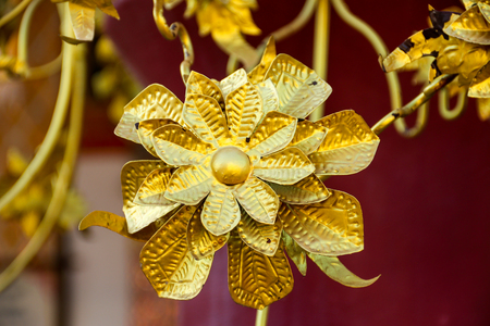 Gold metal flower from hand madeの写真素材