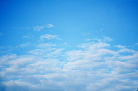 Blue sky with clouds background.の写真素材