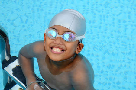 Asian Boy in the swimming pool の写真素材