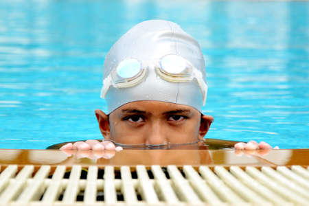 Asian Boy in the swimming pool の写真素材