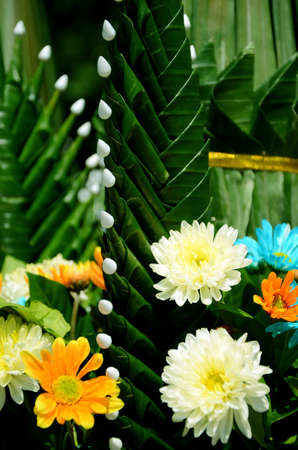 Thai craft made from banana leaves decorated with flowers.の写真素材