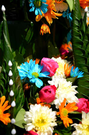 Thai craft made from banana leaves decorated with flowers.の写真素材