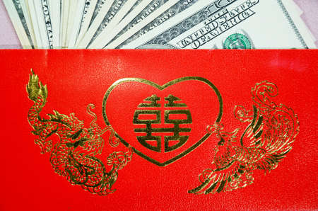  Ang Pao  a red envelope with good words and lucky sign contains gift of money for a Chinese wedding ceremony の写真素材