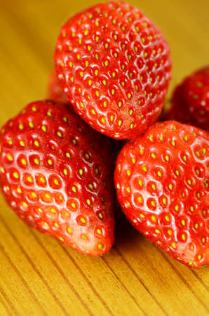 Fresh strawberry on wood background の写真素材