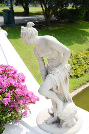 Stone statue of lady in the garden の写真素材