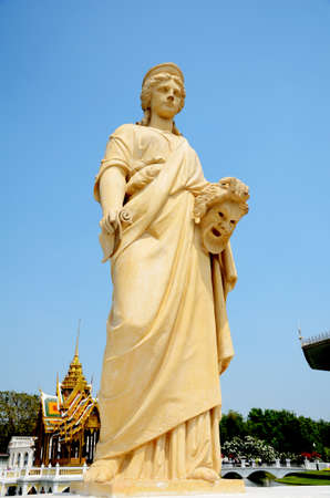Stone statue of lady in the garden の写真素材