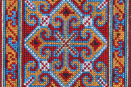 Cross stitch embroidery on canvas の写真素材