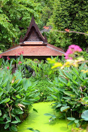 Old Style of Small Garden Around Groups of Vintage Thai House の写真素材