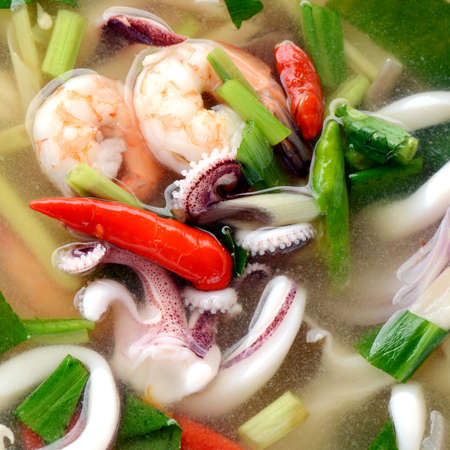 Spicy Lemon Grass Soup with Squids and Shrimps の写真素材