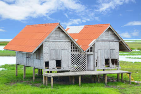 Native fisherman huts nearby the sea のeditorial素材