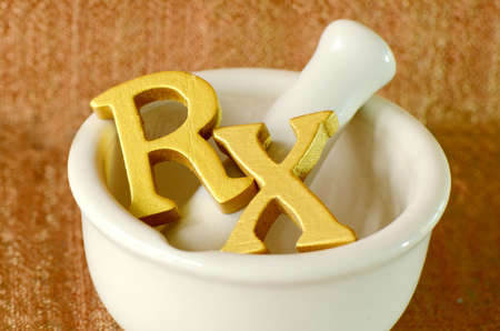 Gold prescription signs in the herbal medicine grinder の写真素材