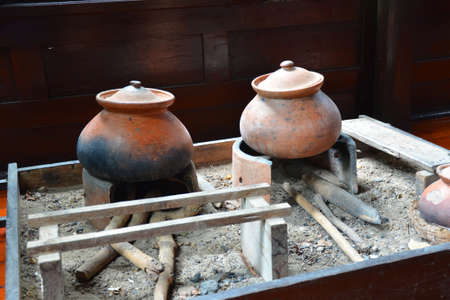 Thai ancient strove and pots set  A traditional Thai style kitchen still found in the countryside の写真素材