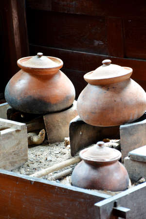 Thai ancient strove and pots set  A traditional Thai style kitchen still found in the countryside の写真素材