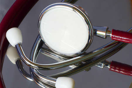 Stethoscope with reflection on the table の写真素材
