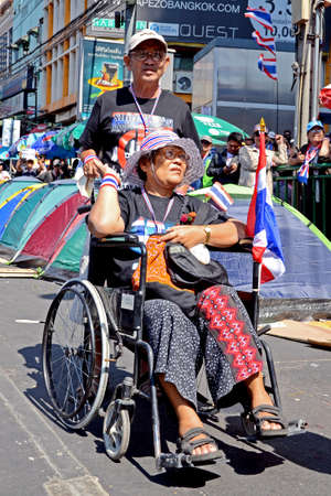 Unidentified protesters protest against Thai government corruption in the second day of joining  Shut down Bangkok  campaign  on January 14,2014 in Bangkok,Thailand のeditorial素材
