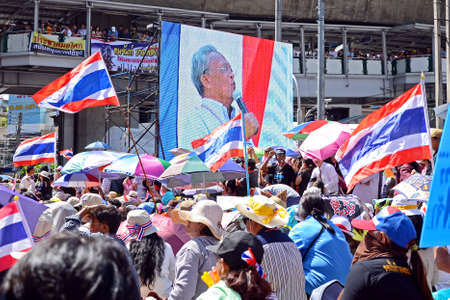 Unidentified protesters protest against Thai government corruption in the second day of joining  Shut down Bangkok  campaign  on January 14,2014 in Bangkok,Thailand のeditorial素材
