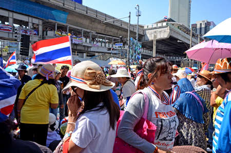Unidentified protesters protest against Thai government corruption in the second day of joining  Shut down Bangkok  campaign  on January 14,2014 in Bangkok,Thailand のeditorial素材