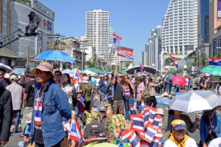 Unidentified protesters protest against Thai government corruption in the second day of joining  Shut down Bangkok  campaign  on January 14,2014 in Bangkok,Thailand のeditorial素材