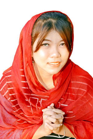 Asian teenager wearing red saree on her head isolated on white background の写真素材