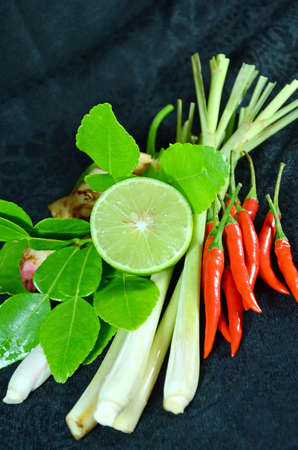Ingredients for Thai cuisine Tom Yum include lemongrass stem, lemon juice, galanga root, chili and kaffir lime leaves の写真素材