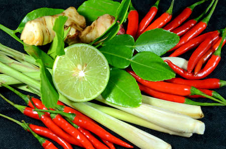 Ingredients for Thai cuisine Tom Yum include lemongrass stem, lemon juice, galanga root, chili and kaffir lime leaves の写真素材