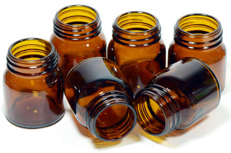 Green Concept of Reduce, Reuse and Recycle with The Amber Glass Bottles on White Background の写真素材