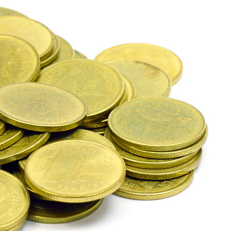Stack of Ancient Gold Coins Isolated on White Background の写真素材
