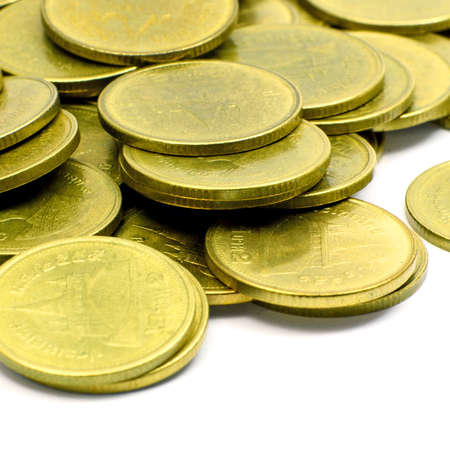 Stack of Ancient Gold Coins Isolated on White Background の写真素材