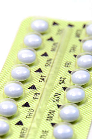 Contraceptive Pill with English Instructions closed-up on white background の写真素材
