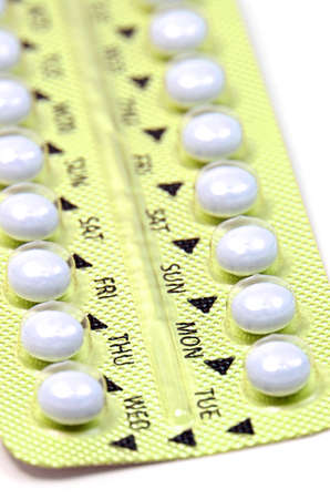 Contraceptive Pill with English Instructions closed-up on white background の写真素材