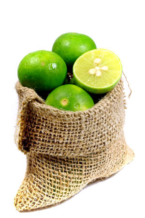 Lime Fruits  Citrus aurantifolia   in little sac の写真素材