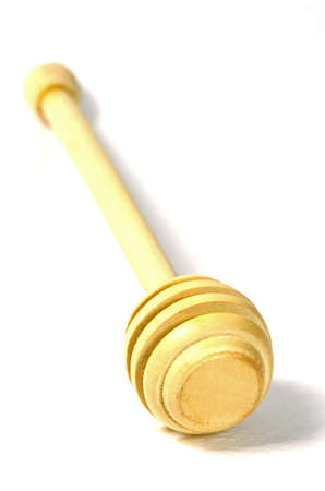 Wooden Honey Dipper Isolated on White Background の写真素材
