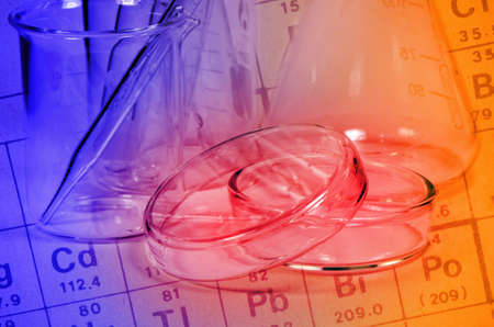 Periodic table of Elements and laboratory glassware in Laboratory Experiment の写真素材
