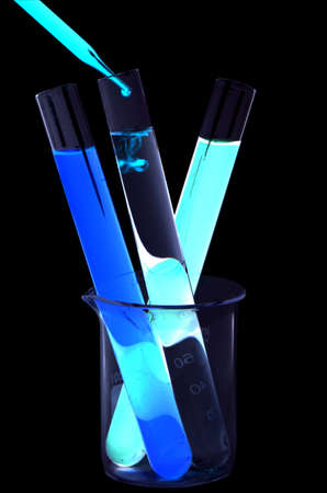 Set of laboratory equipment and chemical solutions isolated on black background with clipping path の写真素材