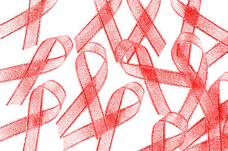 World Aids Day Red Ribbon Sign on White Background.の写真素材