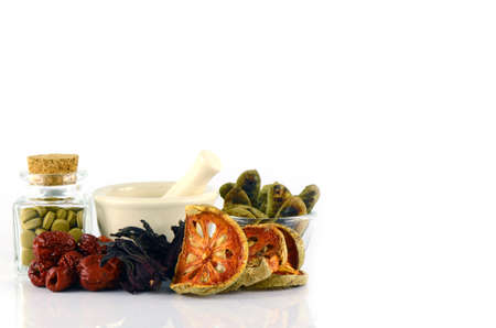 Herbal Medicine tablet and dried herbs.の写真素材