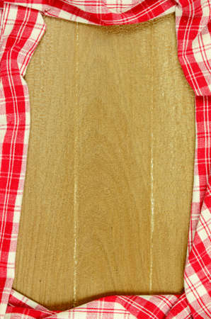 Red Table Cloth with Old Wooden Table Background.の写真素材