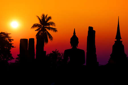 Silhouette of Buddha Sculpture in The Ancient City.の写真素材