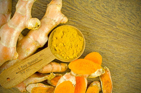 Turmeric (Curcuma longa L.) root and turmeric powder for alternative medicine ,spa products and food ingredient.の写真素材