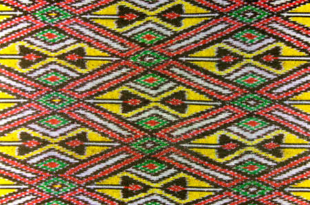 Pattern of Thai Hand Woven Cotton Fabric for Clothing and Home Decoration.の写真素材