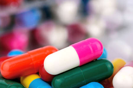 Colorful of oral medications on Blurred Bokeh Background.
