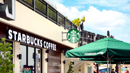 BANGKOK, THAILAND - JUNE 28, 2015: A new branch of Starbucks coffee available in Bangkok, Thailand. Starbucks is the largest coffee franchises in the world, currently.のeditorial素材