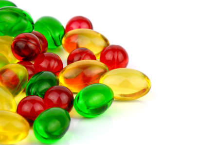 Soft gelatin capsule medicine on white background.