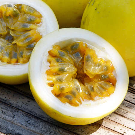 Yellow passion fruit (Passiflora edulis) on natural background.