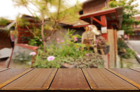 Blurred vintage backyard garden background with perspective wood window view.の写真素材