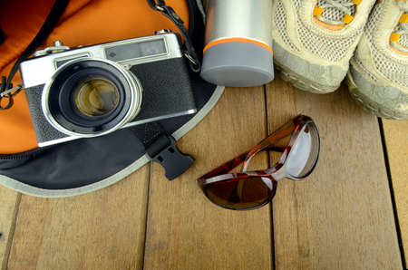 Travelling set with wood background.の写真素材