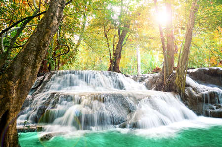 Beautiful scenic of waterfall with autumn forest.の写真素材
