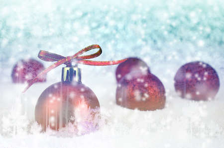 Red Christmas Ball with Bokeh in Blue MoonTone.の写真素材