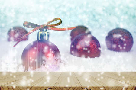 Red Christmas Ball with Bokeh in Blue MoonTone.の写真素材